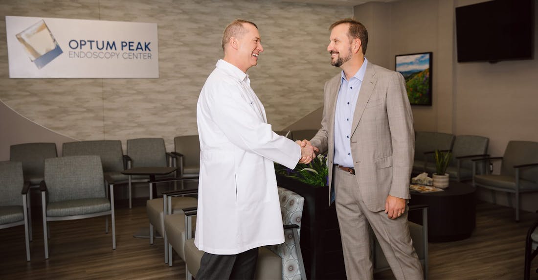 two men shaking hands