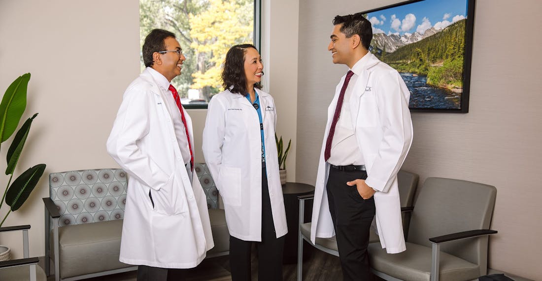 three doctors talking