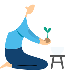 A woman holding a plant
