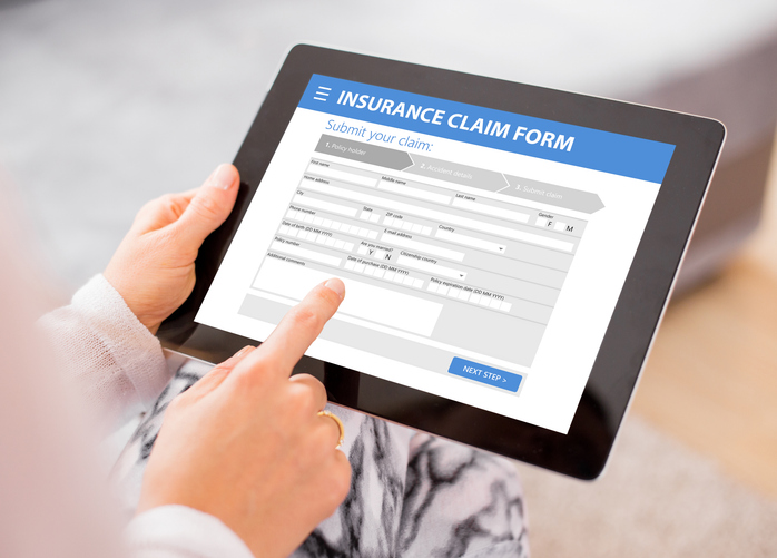 Gardian Insurance Broker in Mackay used this photo with Insurance Claim Form written on it.