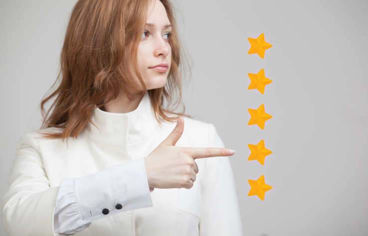 A lady choosing one from the 5 stars