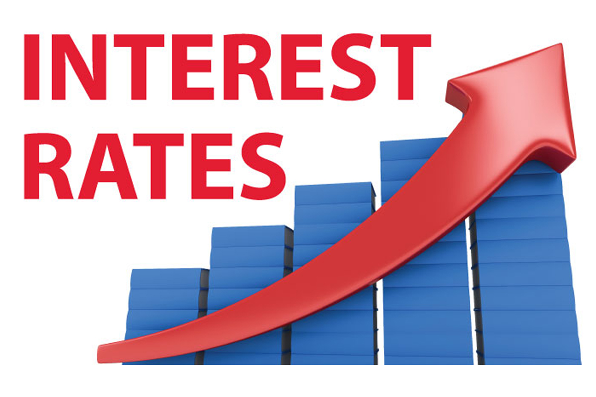 The words interest rates written on the top left corner and beside it is a blue graph with red arrow going up.