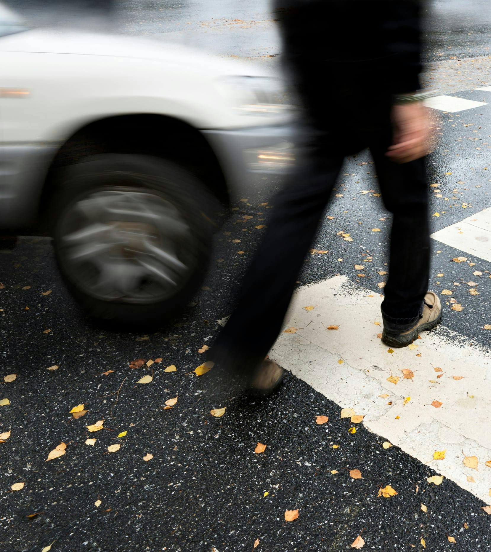 man crossing the street