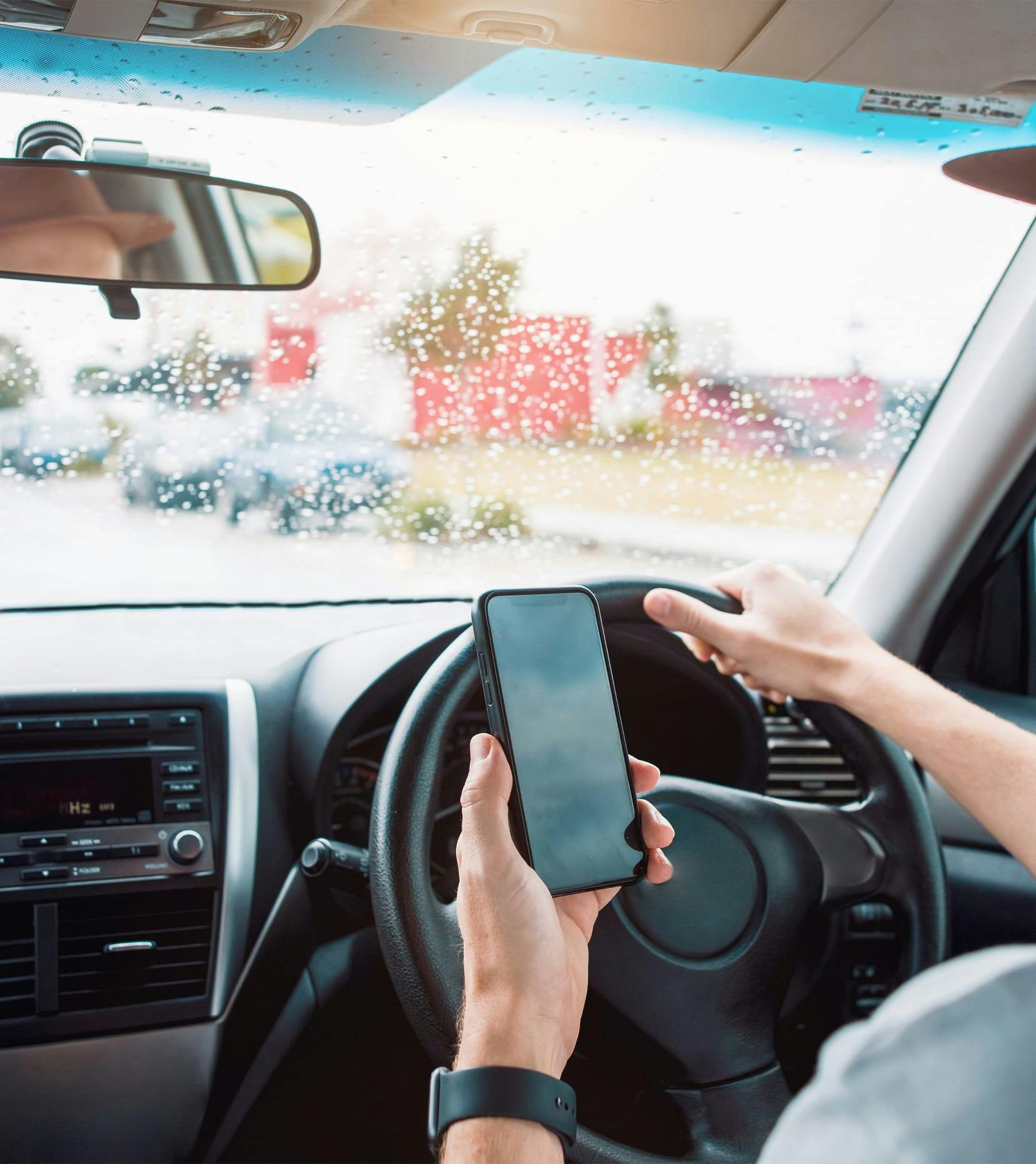 driver looking at phone