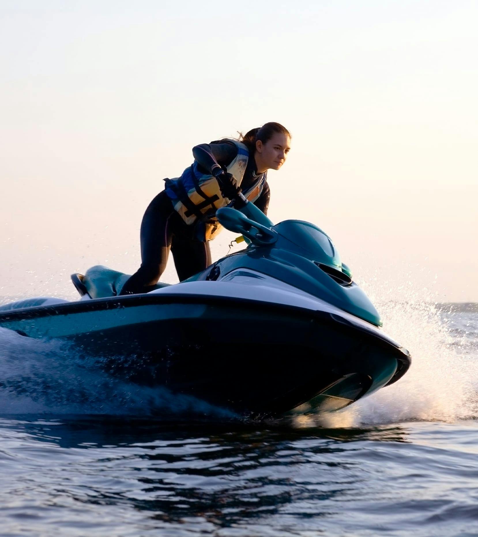 woman riding jet ski