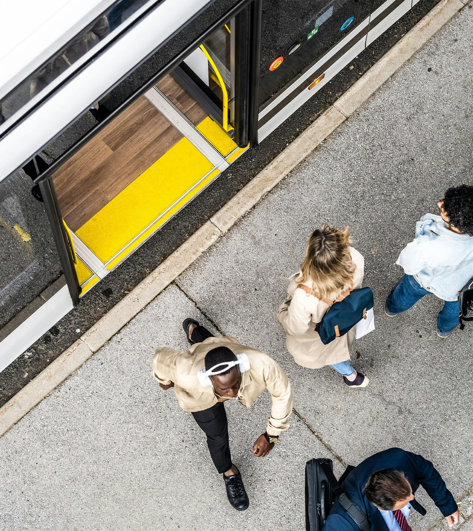 people getting off bus