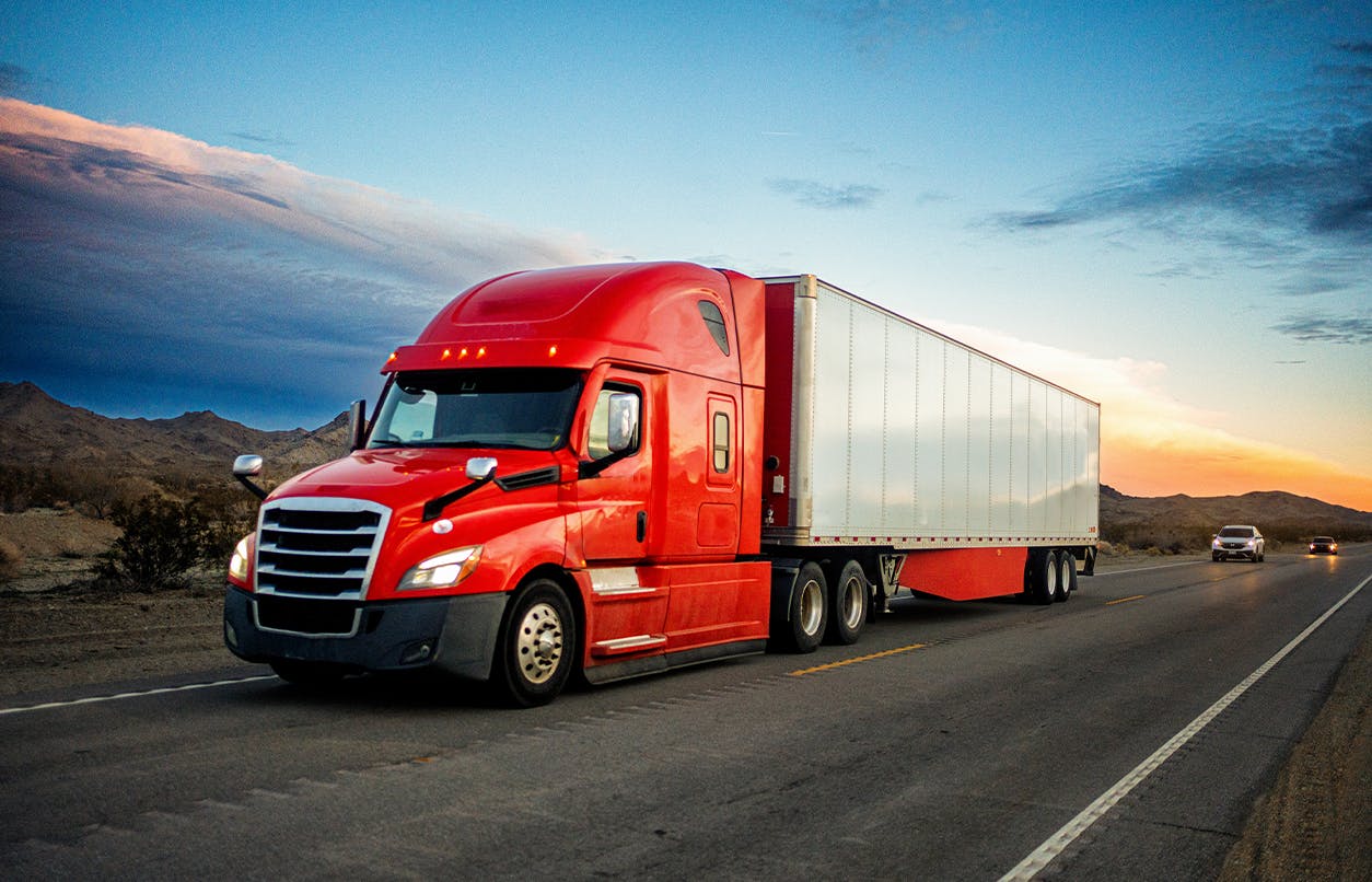 truck driving down highway