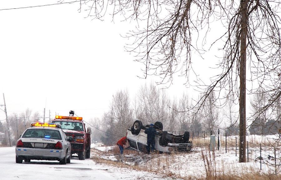 rolled over car in snow