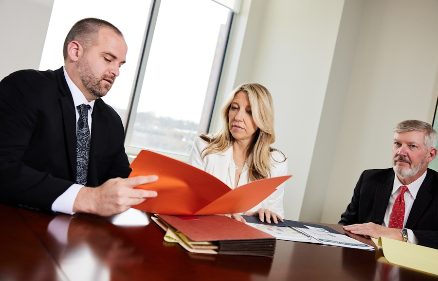 Matt, Jill, and Kirk in conference