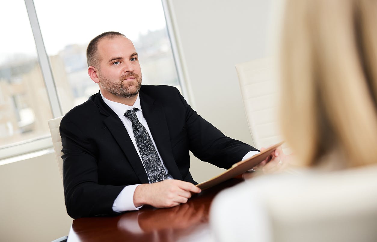 Matt Mccoy at conference table