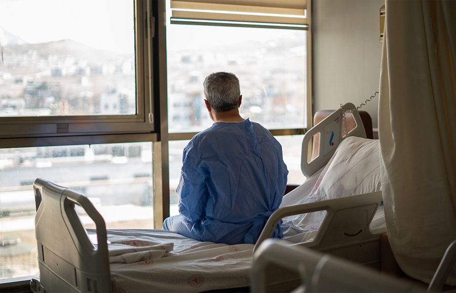 hospital patient sitting in bed
