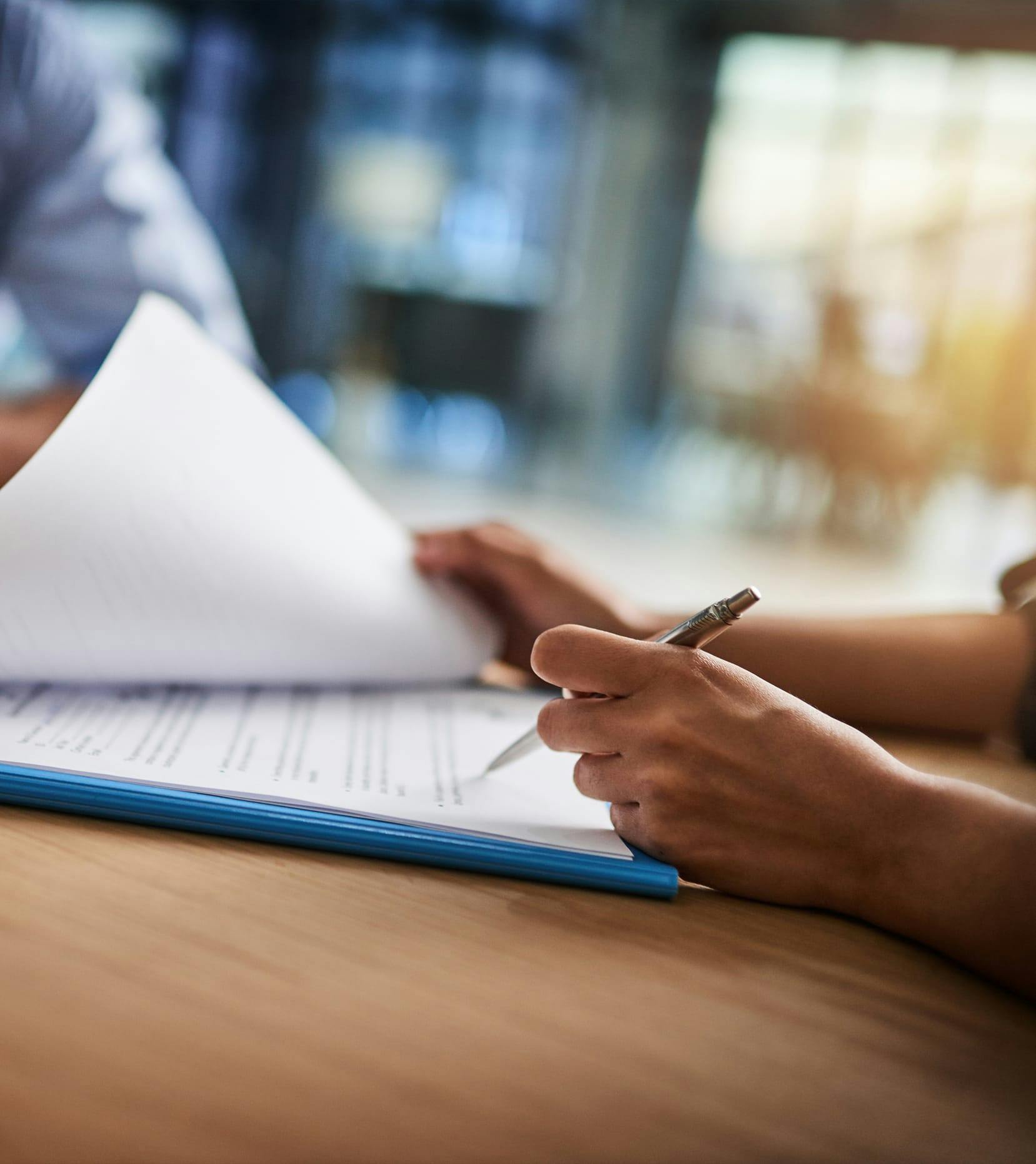 woman signing contract
