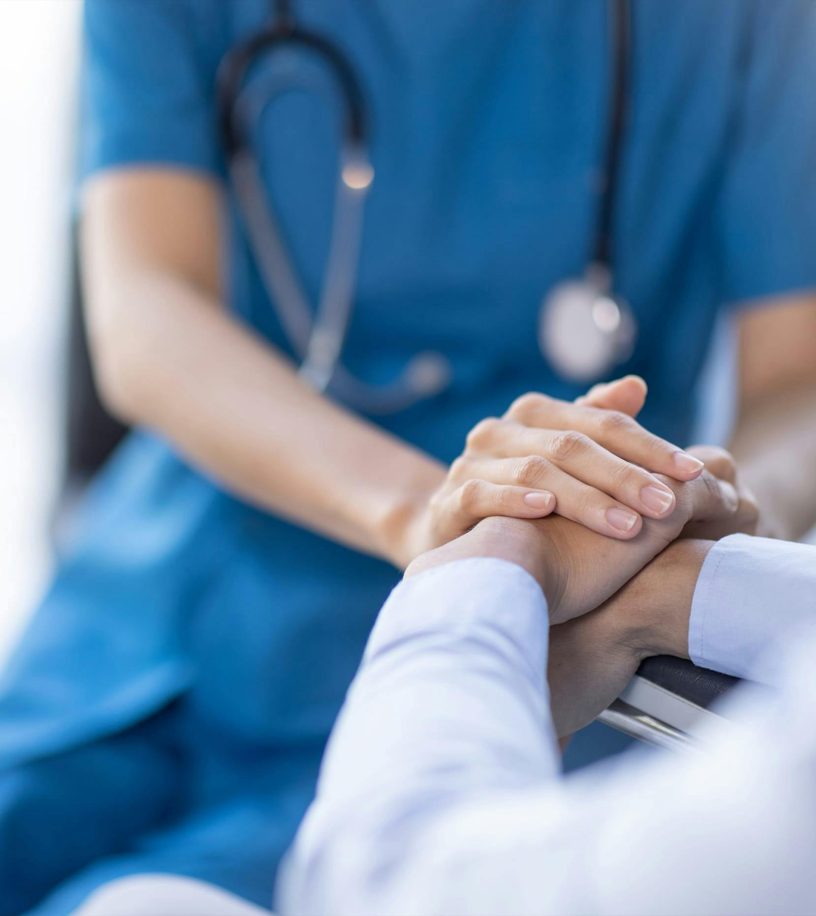 nurse caring for patient