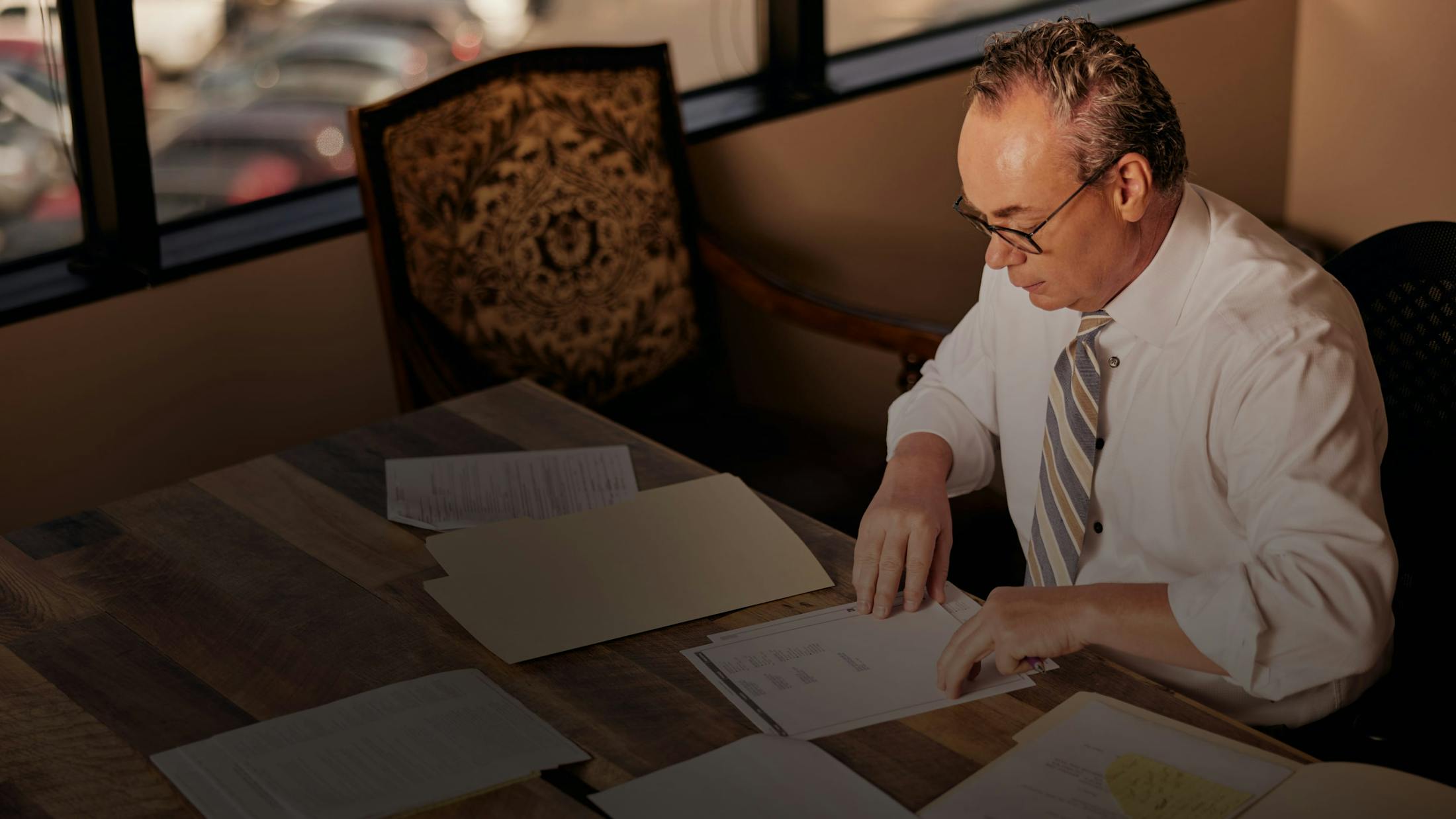 James Belote working in his office.