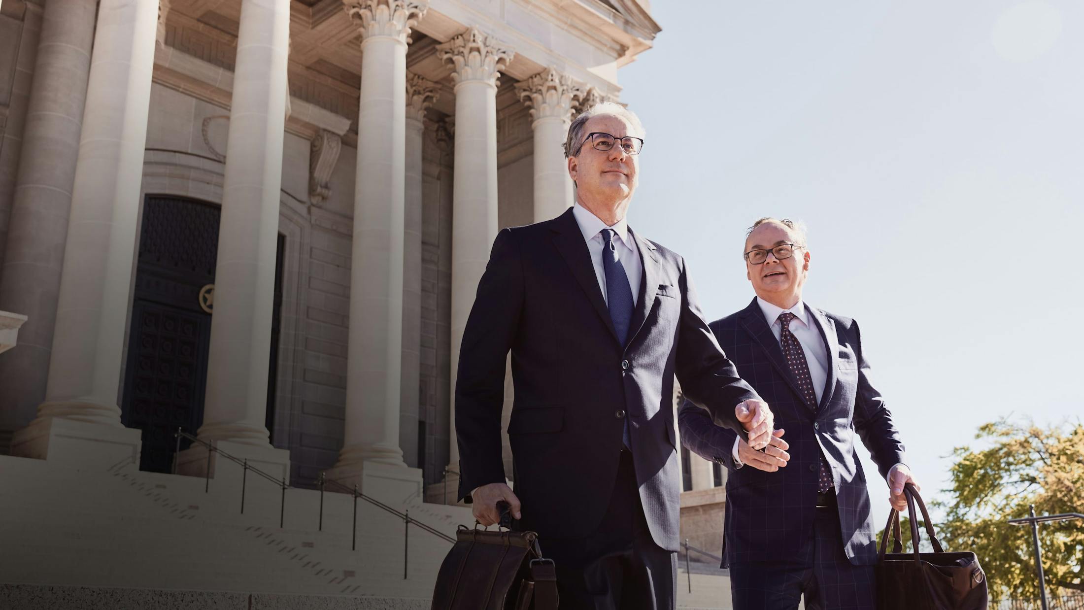 Stipe and Belote walking out of the court house.