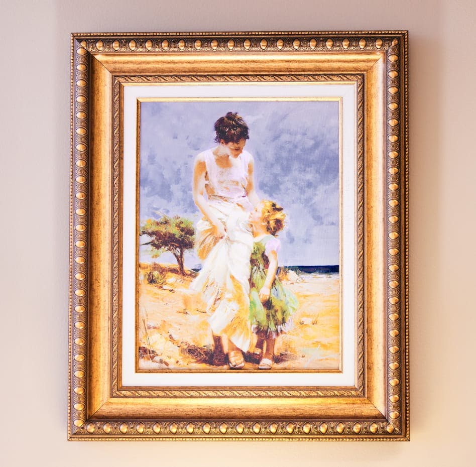 art from Stipe & Belote's office - oil painting of woman with child