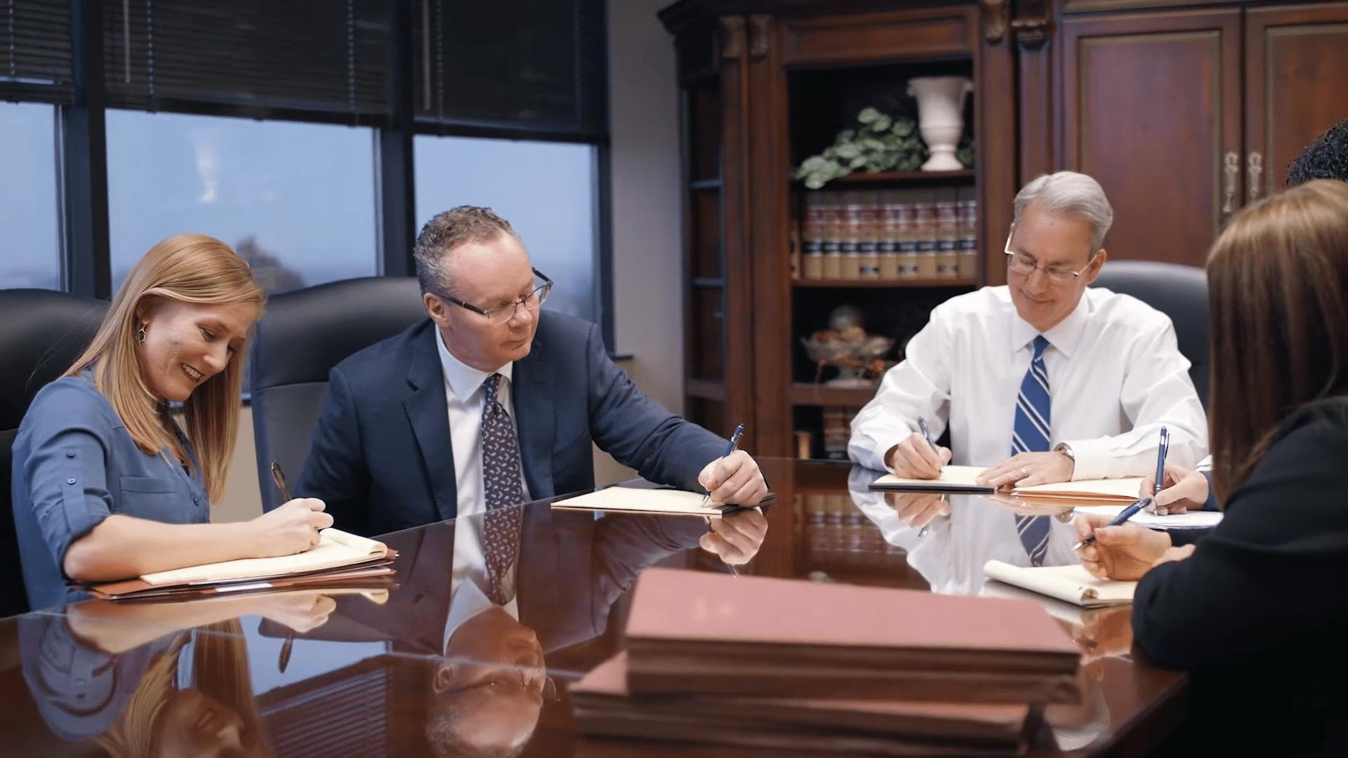 Stipe & Belote working with staff.