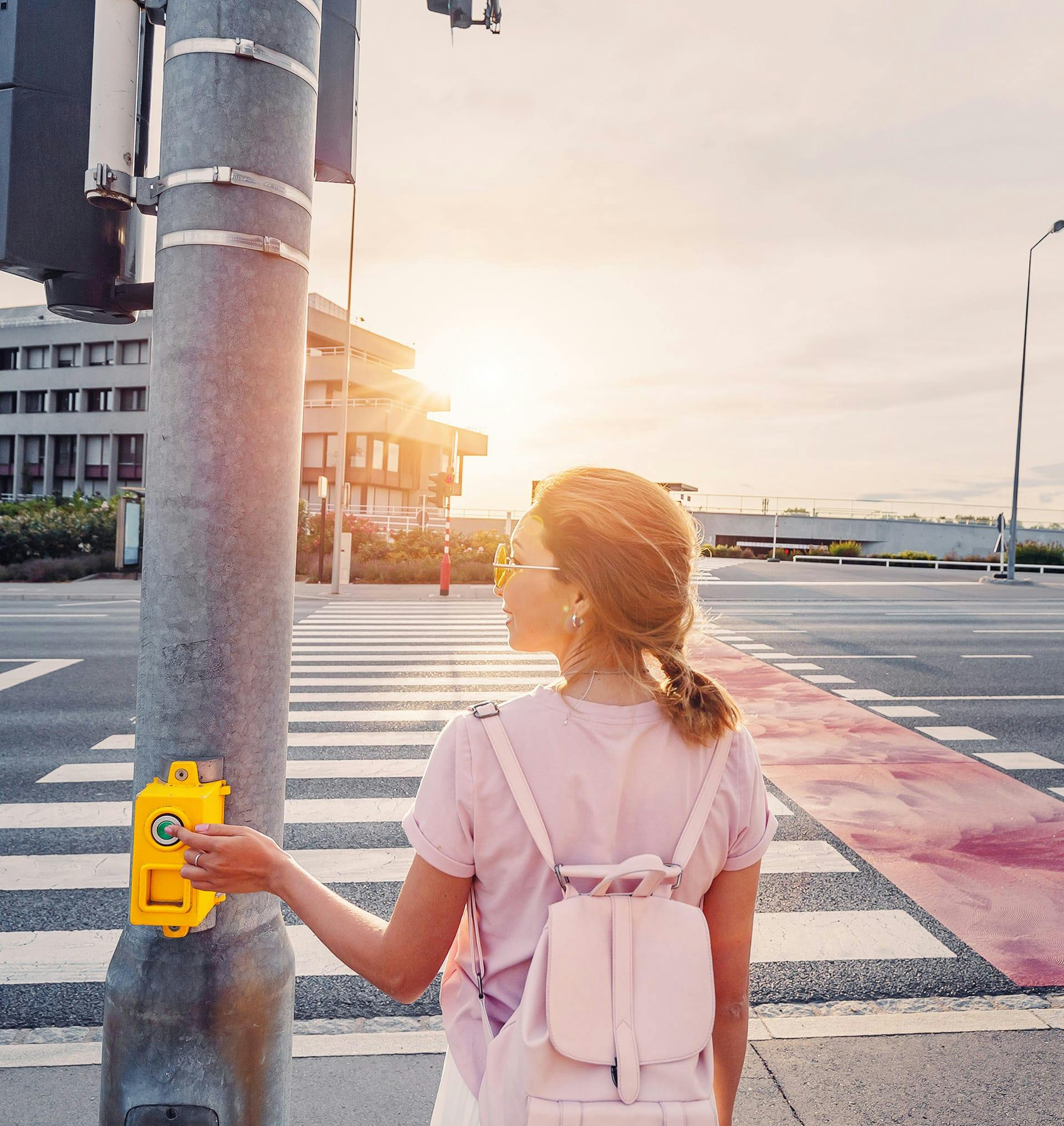 woman waiting to cross road