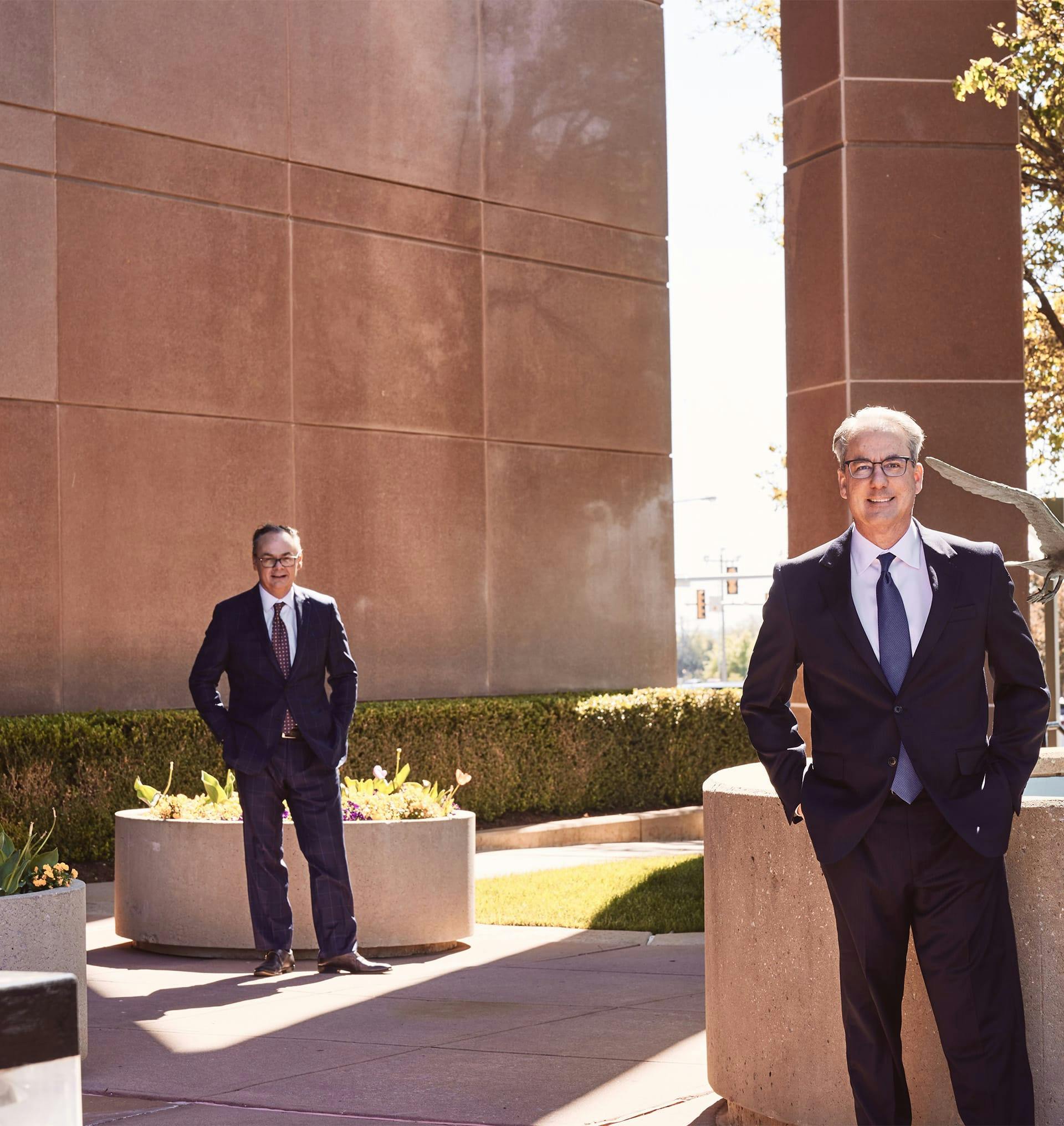 Stipe and Belote standing outside