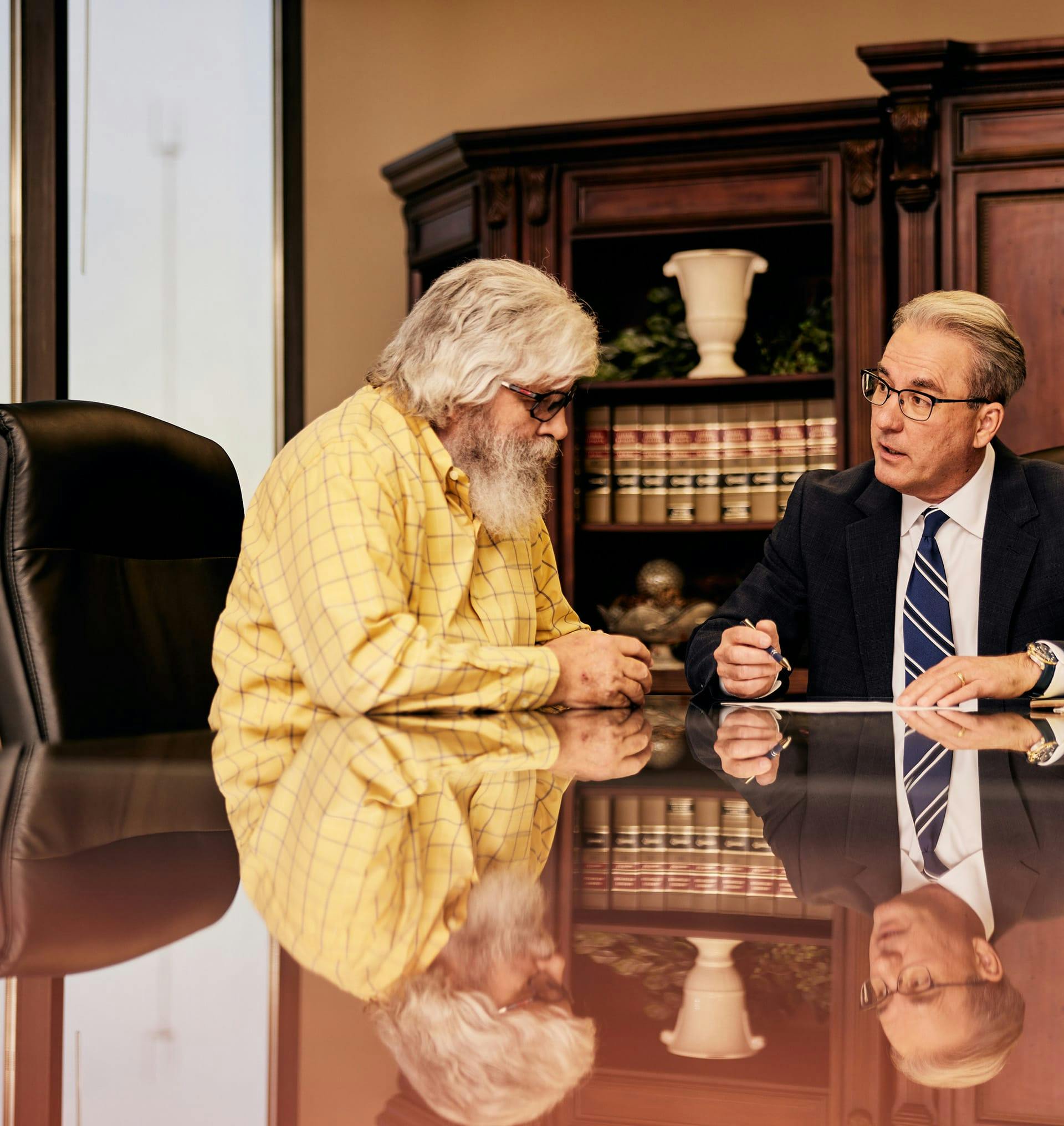 James Belote talking to a man