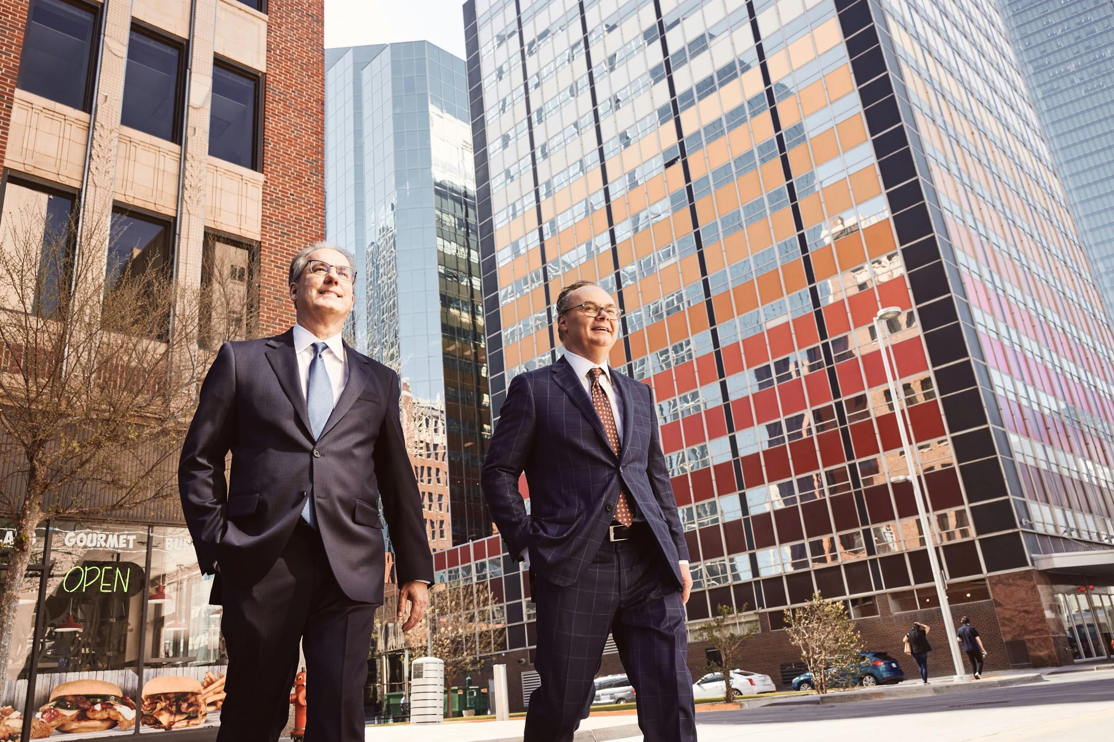 Stipe and Belote walking through the streets of Oklahoma City