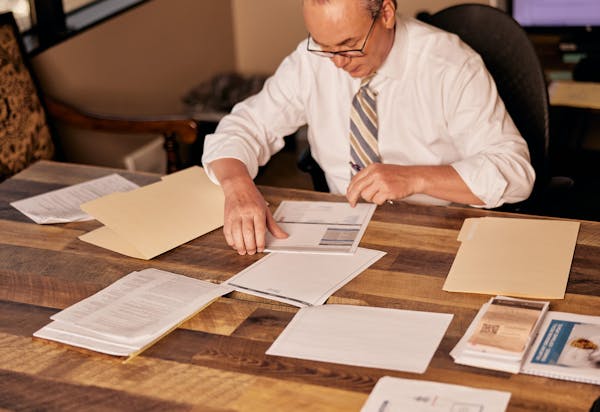 Jack Stipe working on paperwork