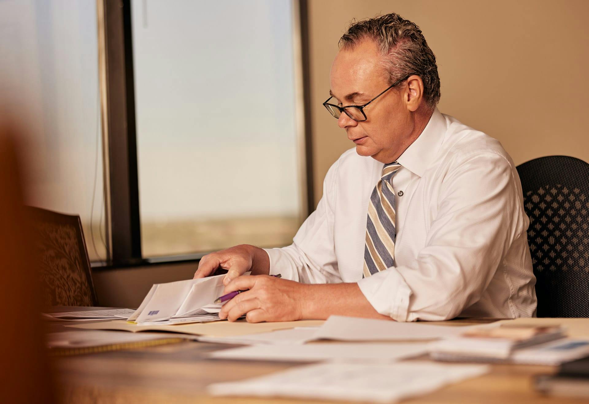 Jack Stipe working on paperwork