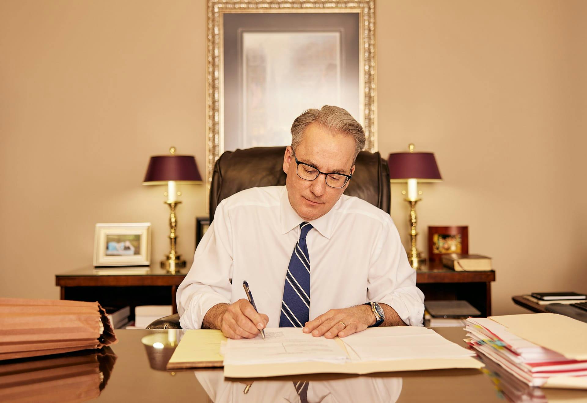 James Belote working on paperwork