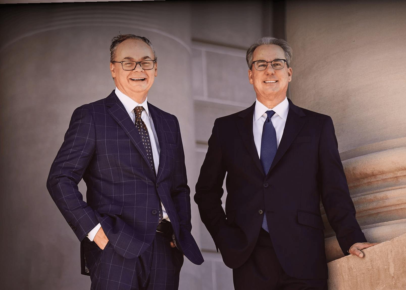 Attorneys Stipe & Belote standing in front of the court house.
