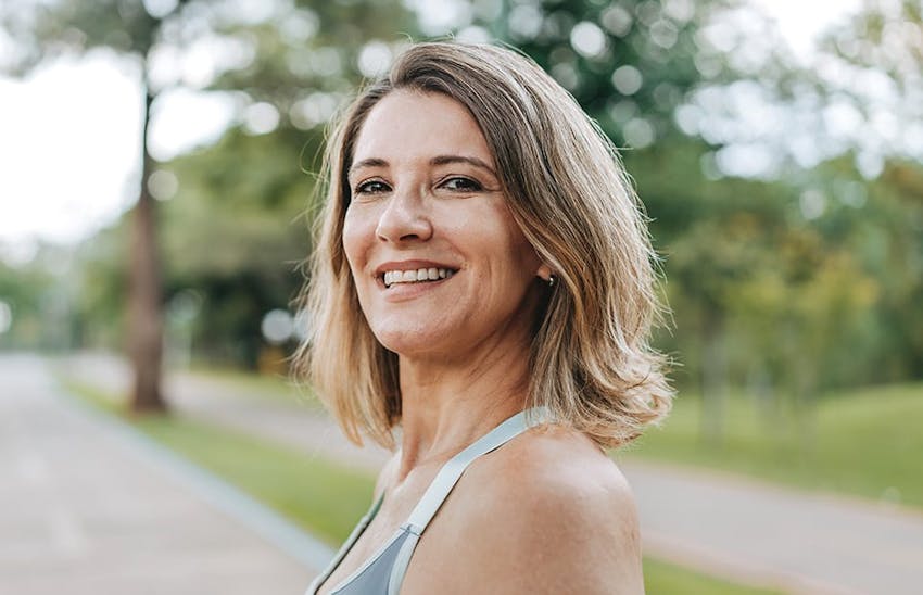 Smiling woman outdoors