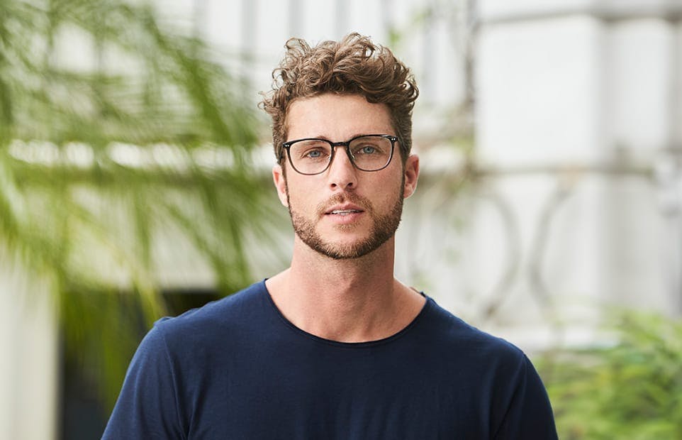 Man wearing glasses outside