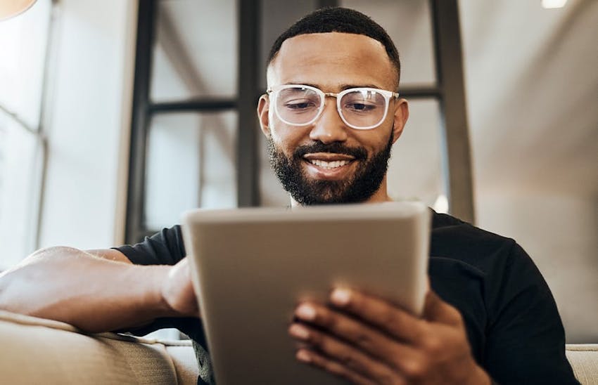 Man looking at tablet