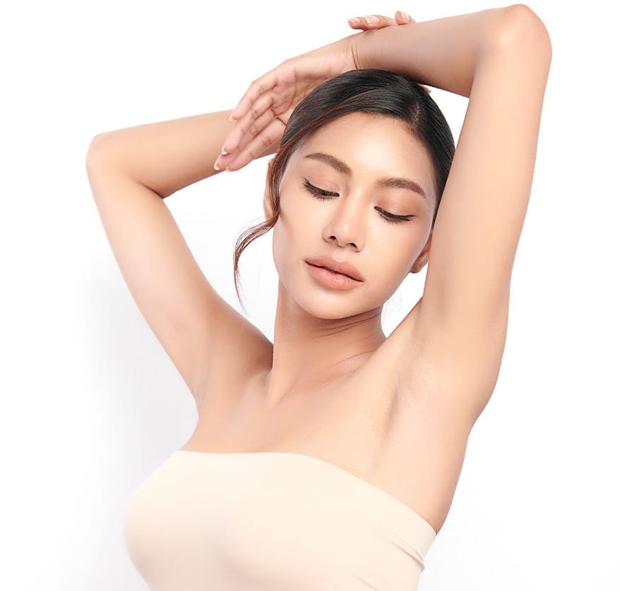 Woman posing with arms over her head