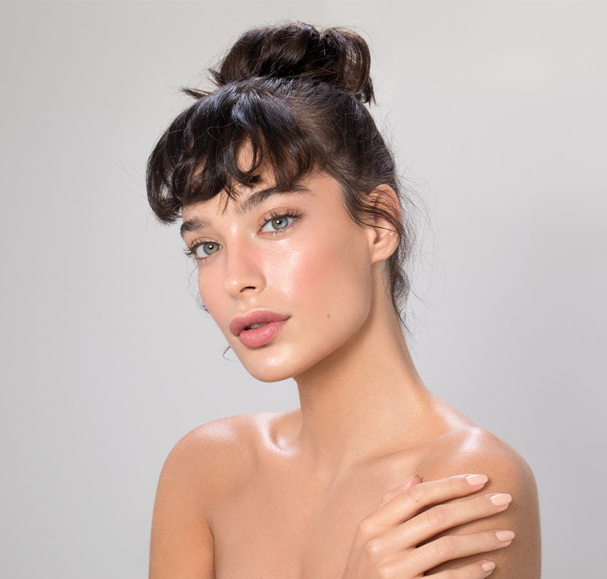 Woman with hair tied back