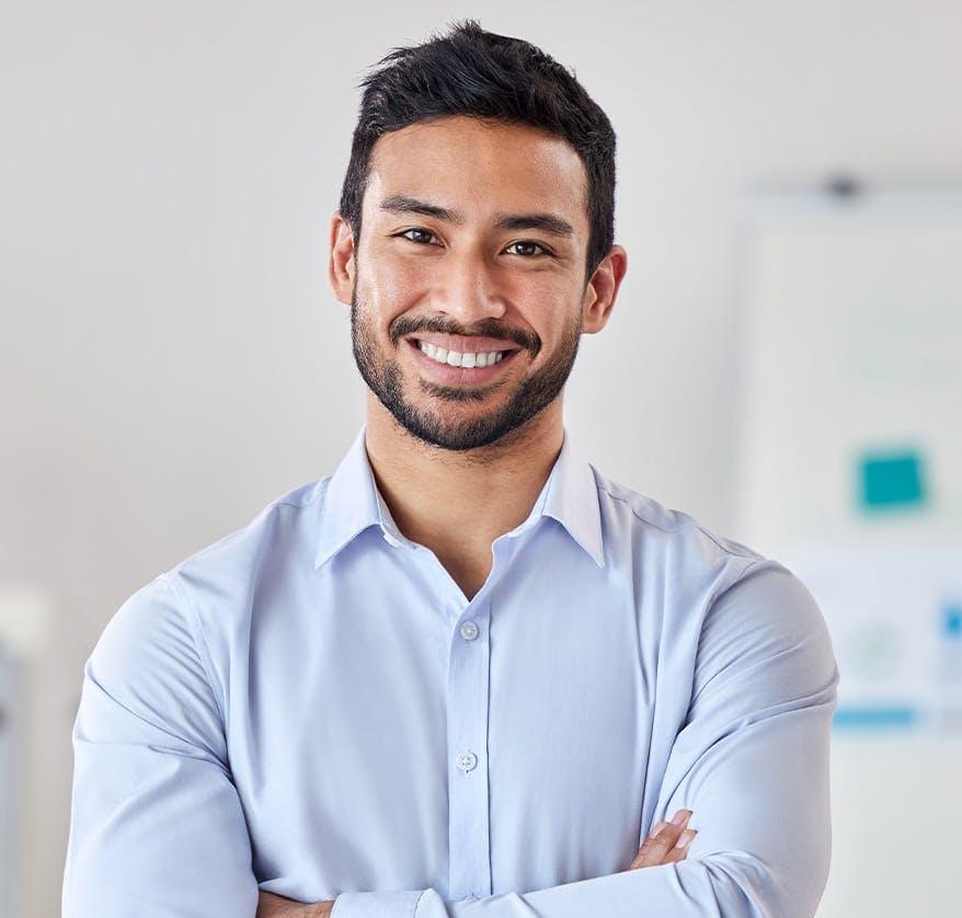 Smiling man in blue shirt