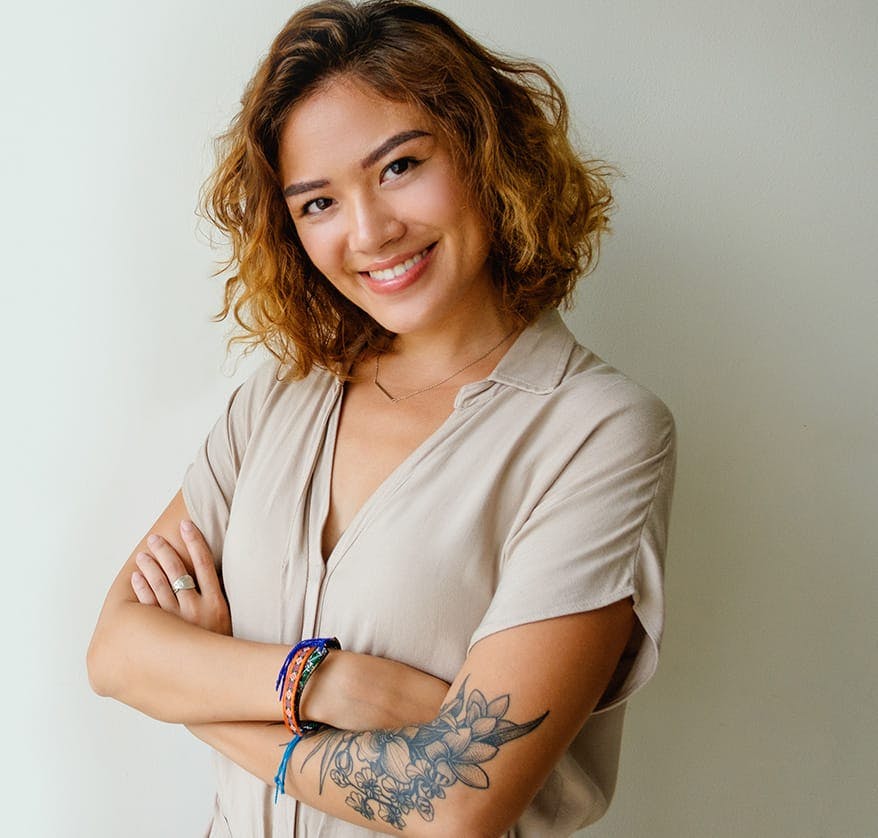 Woman with large tattoo on her arm