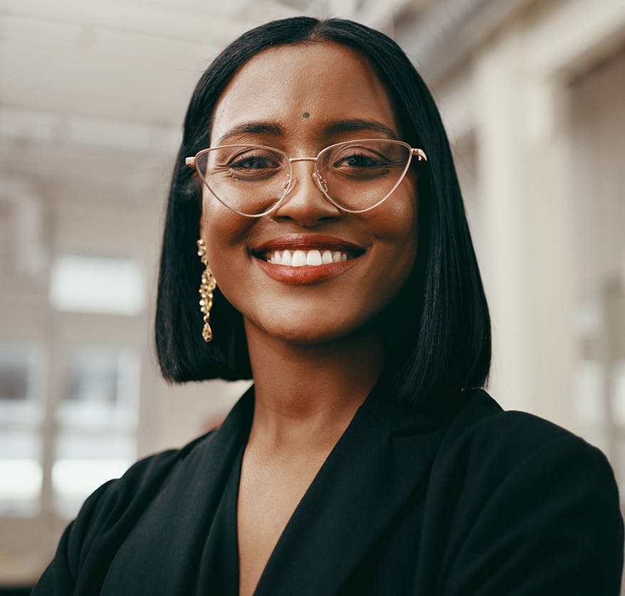 Woman with glasses smiling