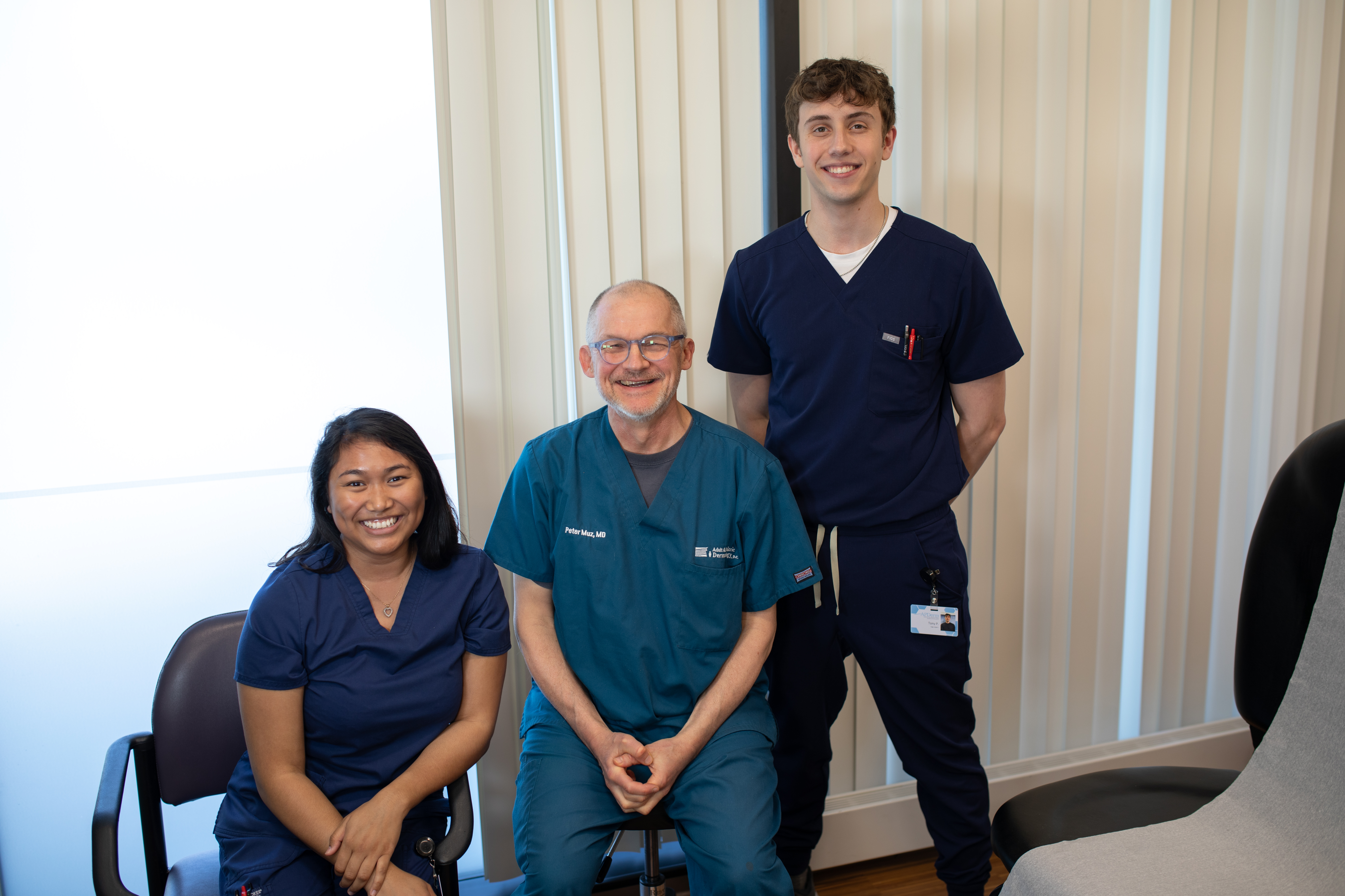 Peter Muz MD with 2 associates