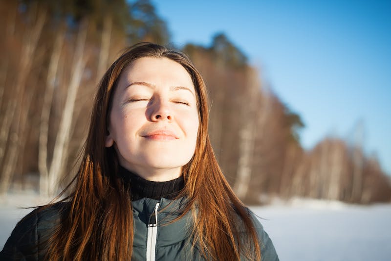 Woman smiling in snow