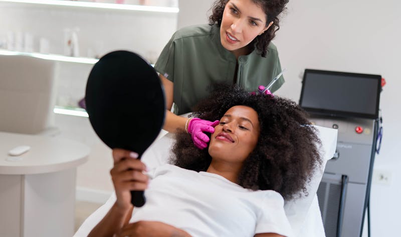 woman getting cosmetic dermatology