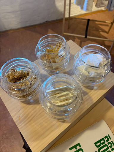 Four jars are featured with different pulp samples