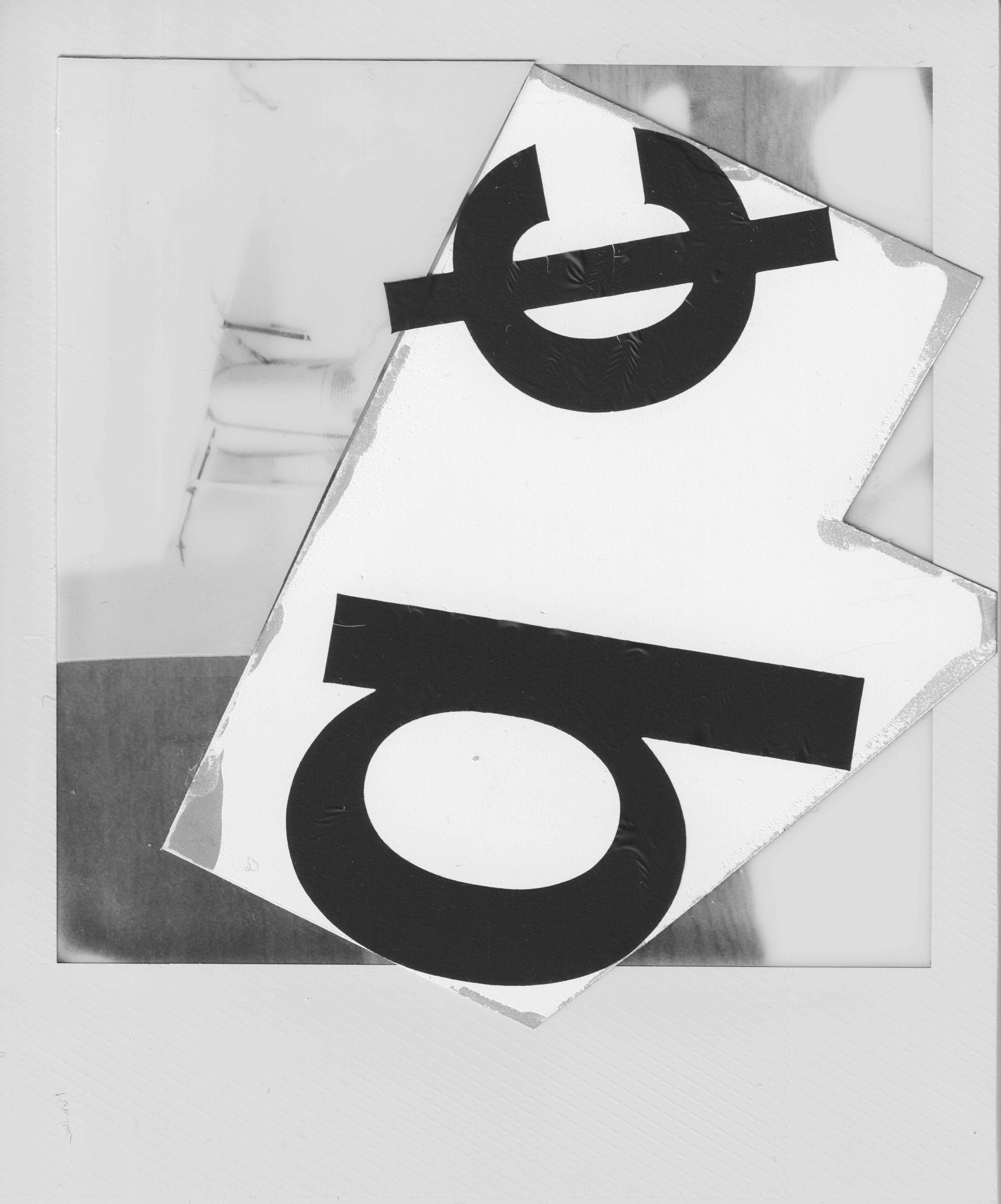 Black and white Polaroid photograph with an abstract composition in a light white color, on top of the photograph there are a cut out letter from another photograph glued onto the surface, on his surface there are two big black letters spelling c and b. The c is crossed over.