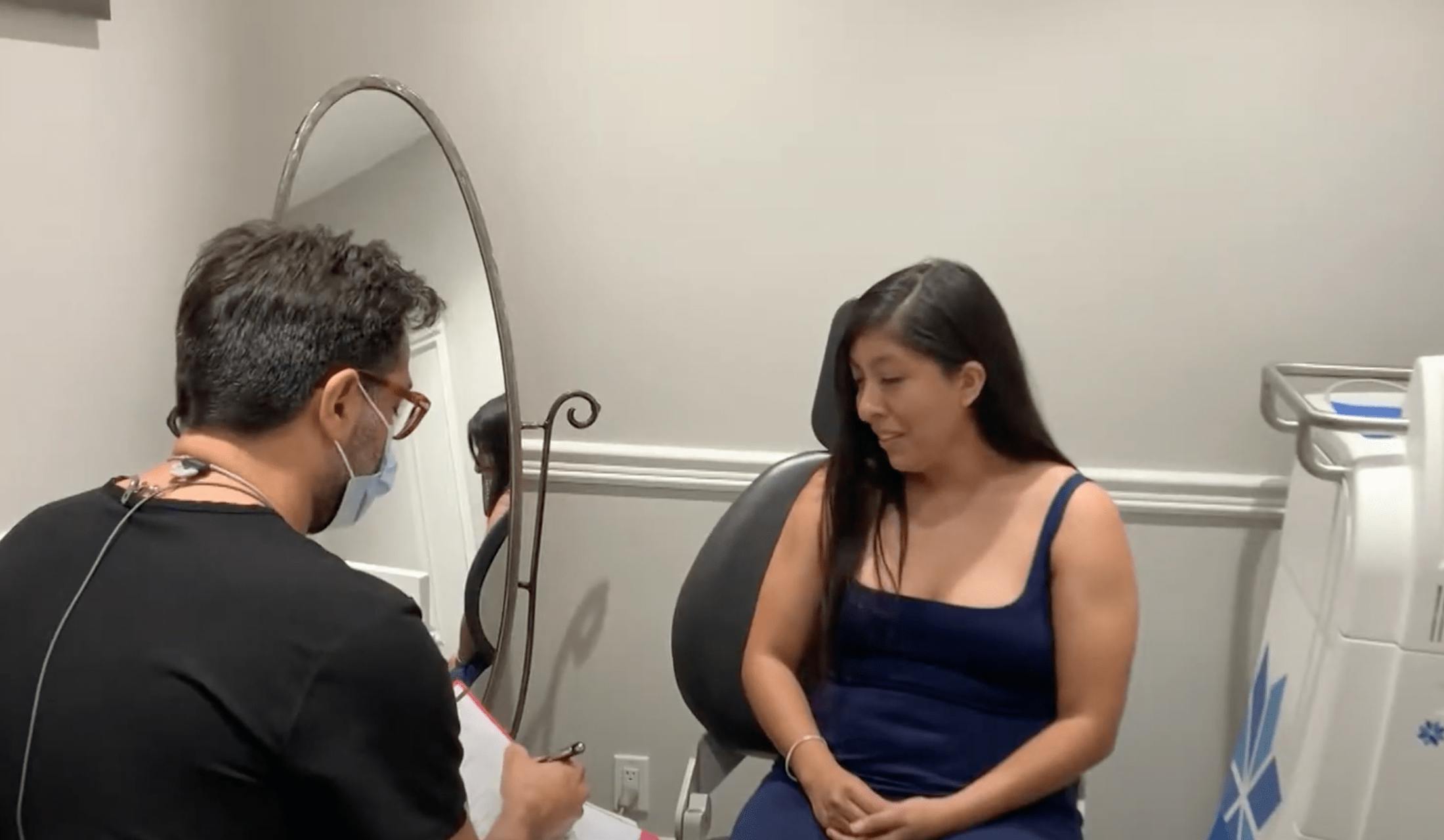 Dr. Rahban examining a patient