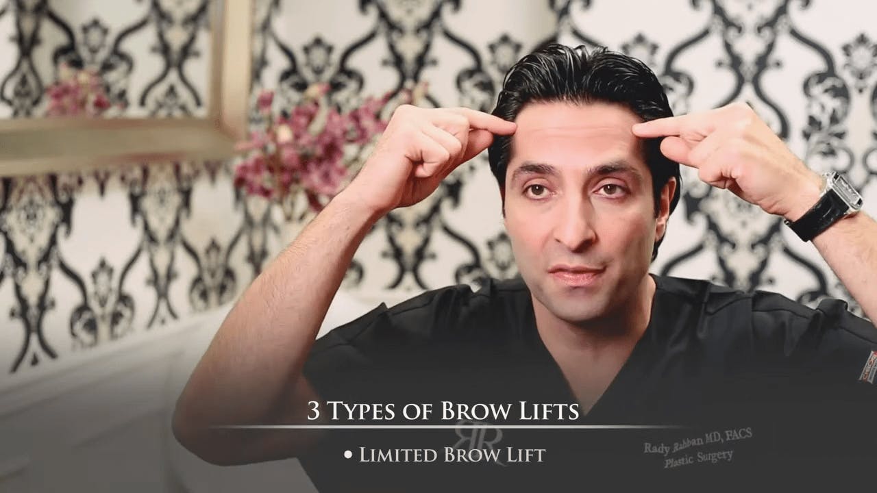 Dr. Rahban touching his forehead