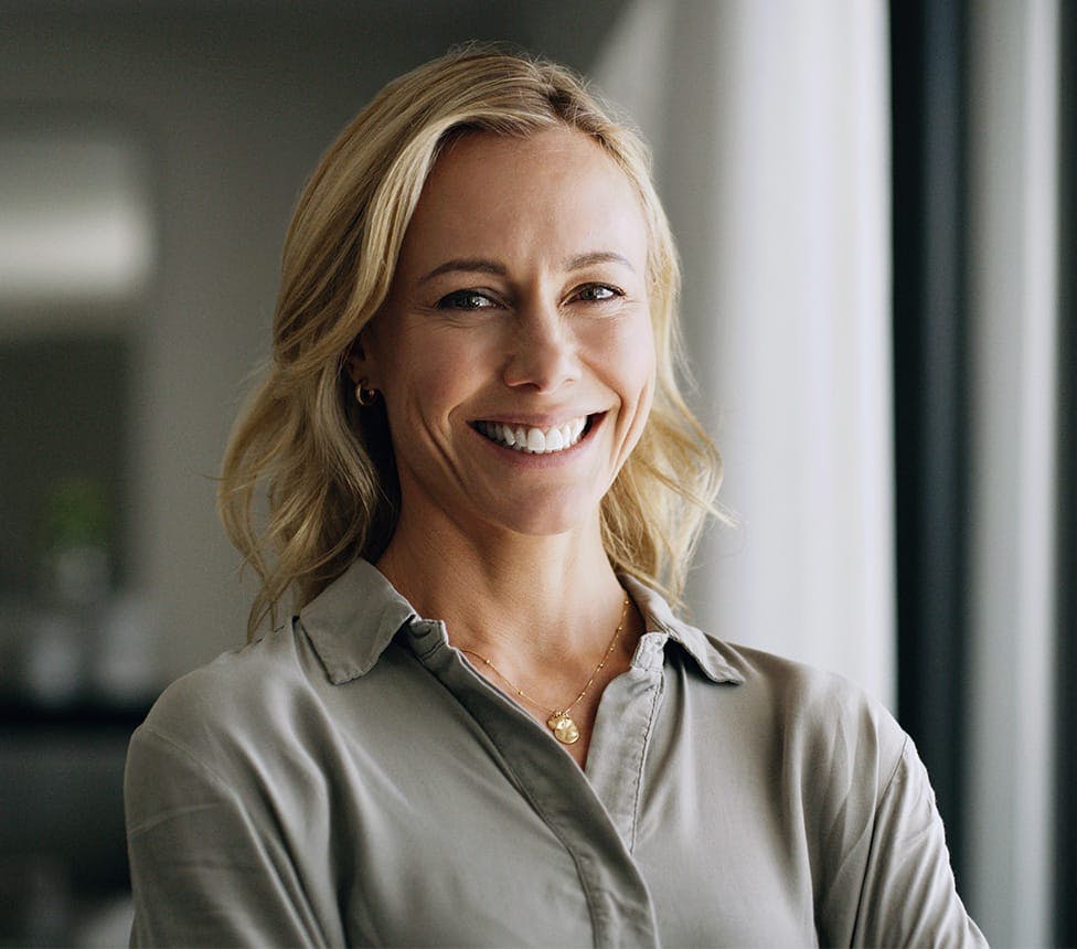 woman with blonde hair smiling