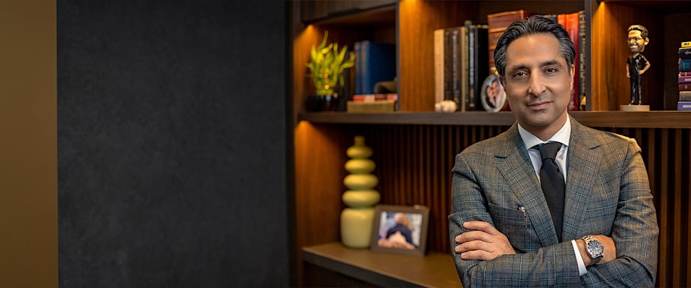 Dr. Rahban crossing his arms