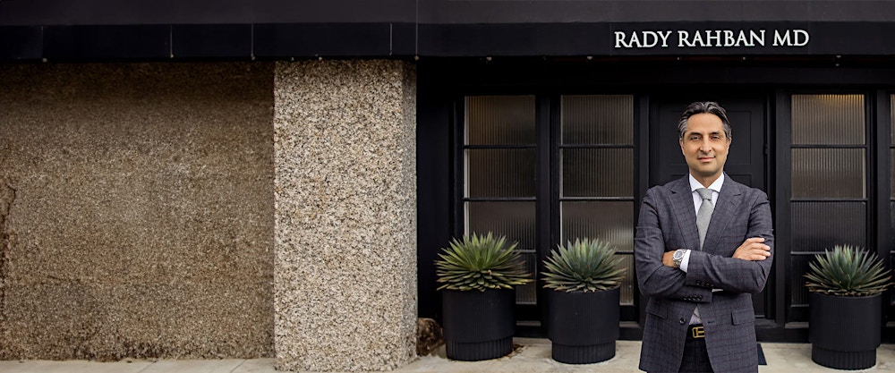 Dr. Rahban standing in front of the office