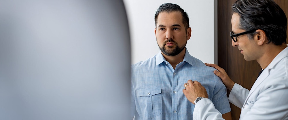 Dr. Rahban examining a patient