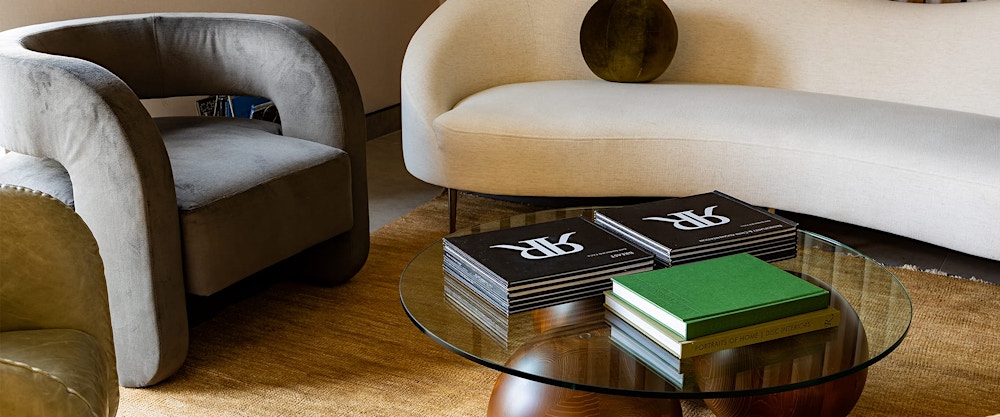 two staff members walking down a hall