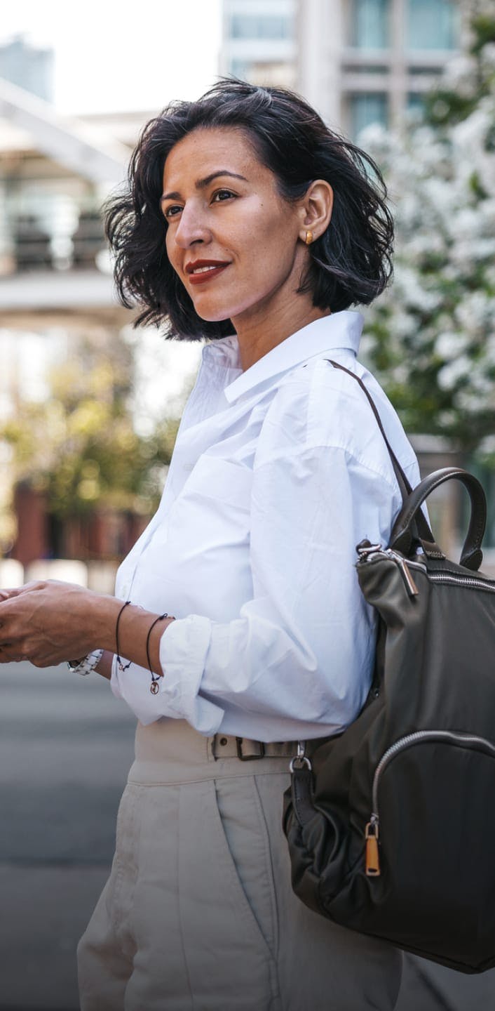 Middle aged woman smiling at something